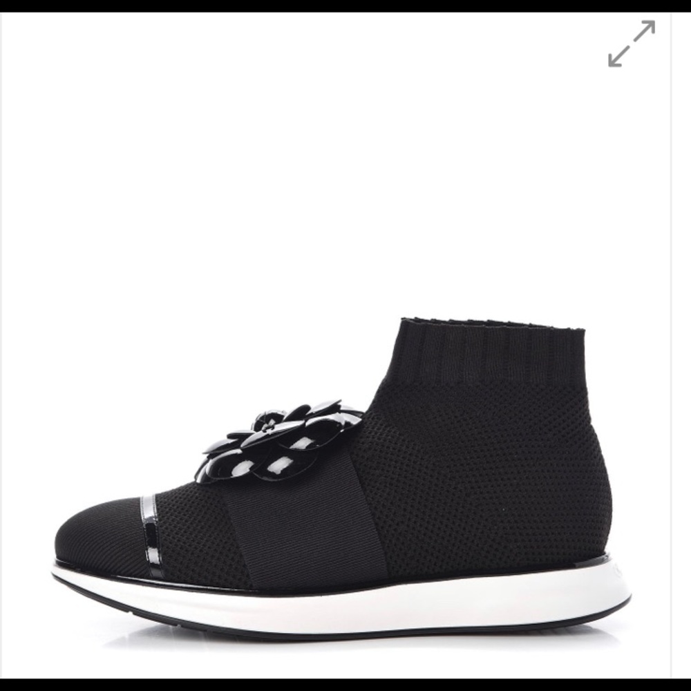 CHANEL knit sneakers with camellia